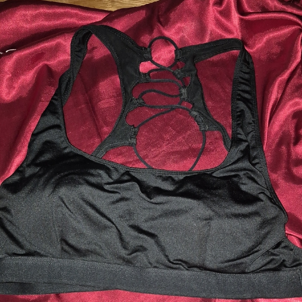 Black Geometric Sports Bra with Criss Croas Cutouts. Open Back.